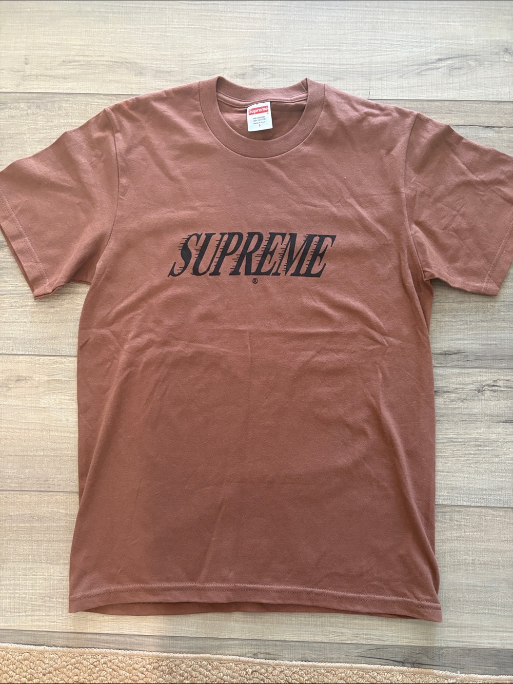 Supreme *Slap Shot Tee*            Brown with Black Script Logo